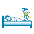 Adult sleeping while a child jumps on the bed